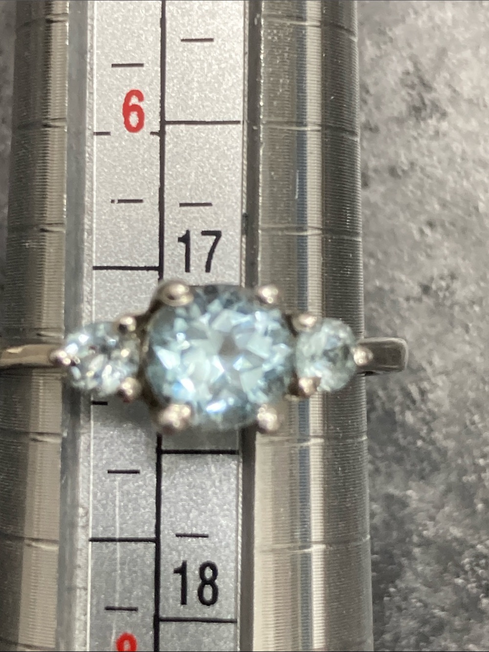 Three-Stone Silver Ring with Light Blue Center Stone